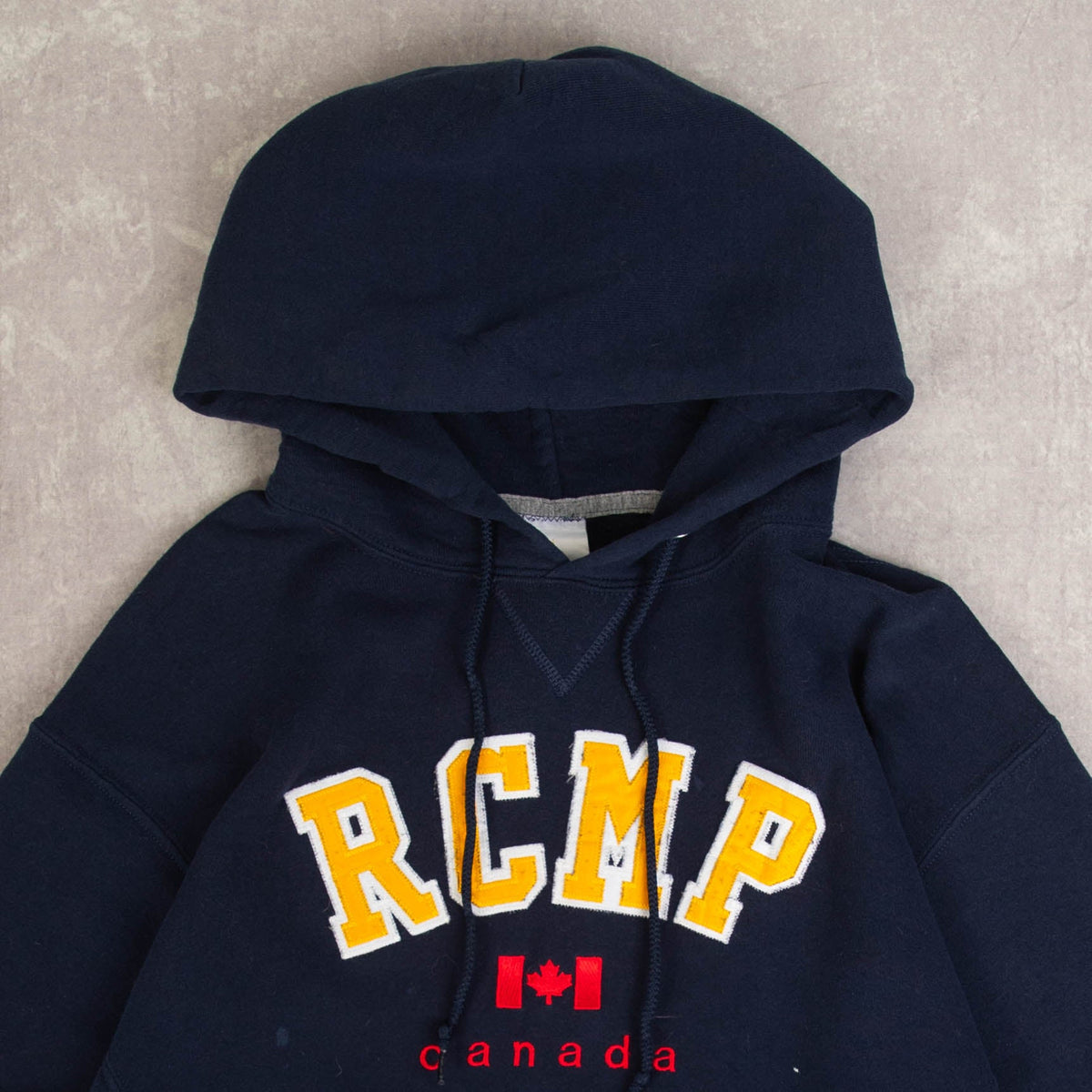 MEN'S VINTAGE RUSSELL ATHLETIC ROYAL CANADIAN MOUNTED POLICE HOODED SWEATSHIRT - MEDIUM