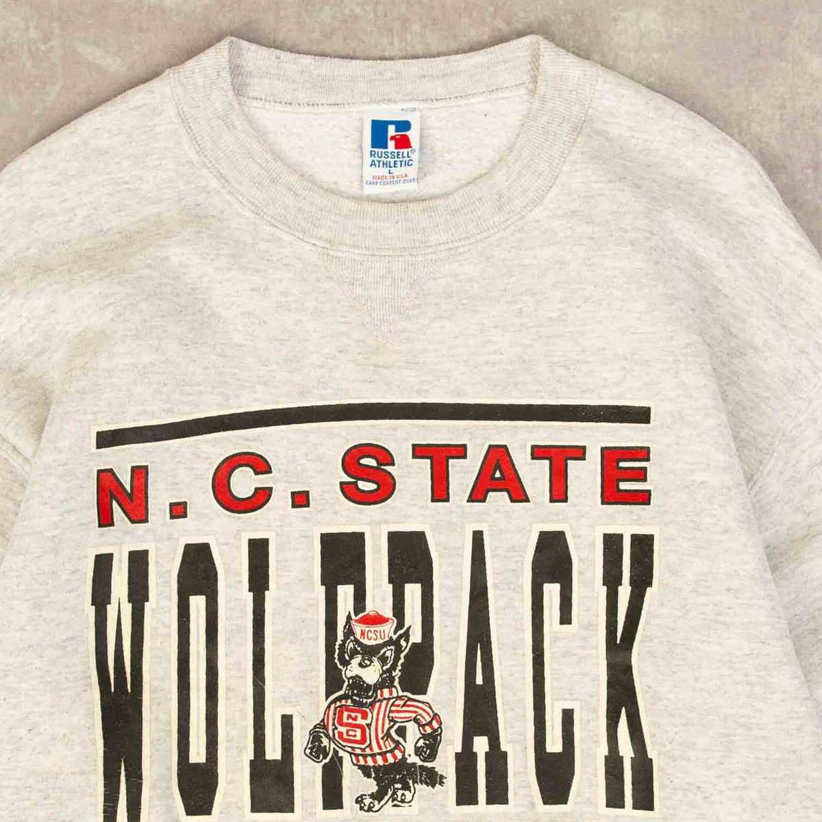 MEN'S VINTAGE 1990S RUSSELL ATHLETIC N.C STATE SWEATSHIRT - LARGE