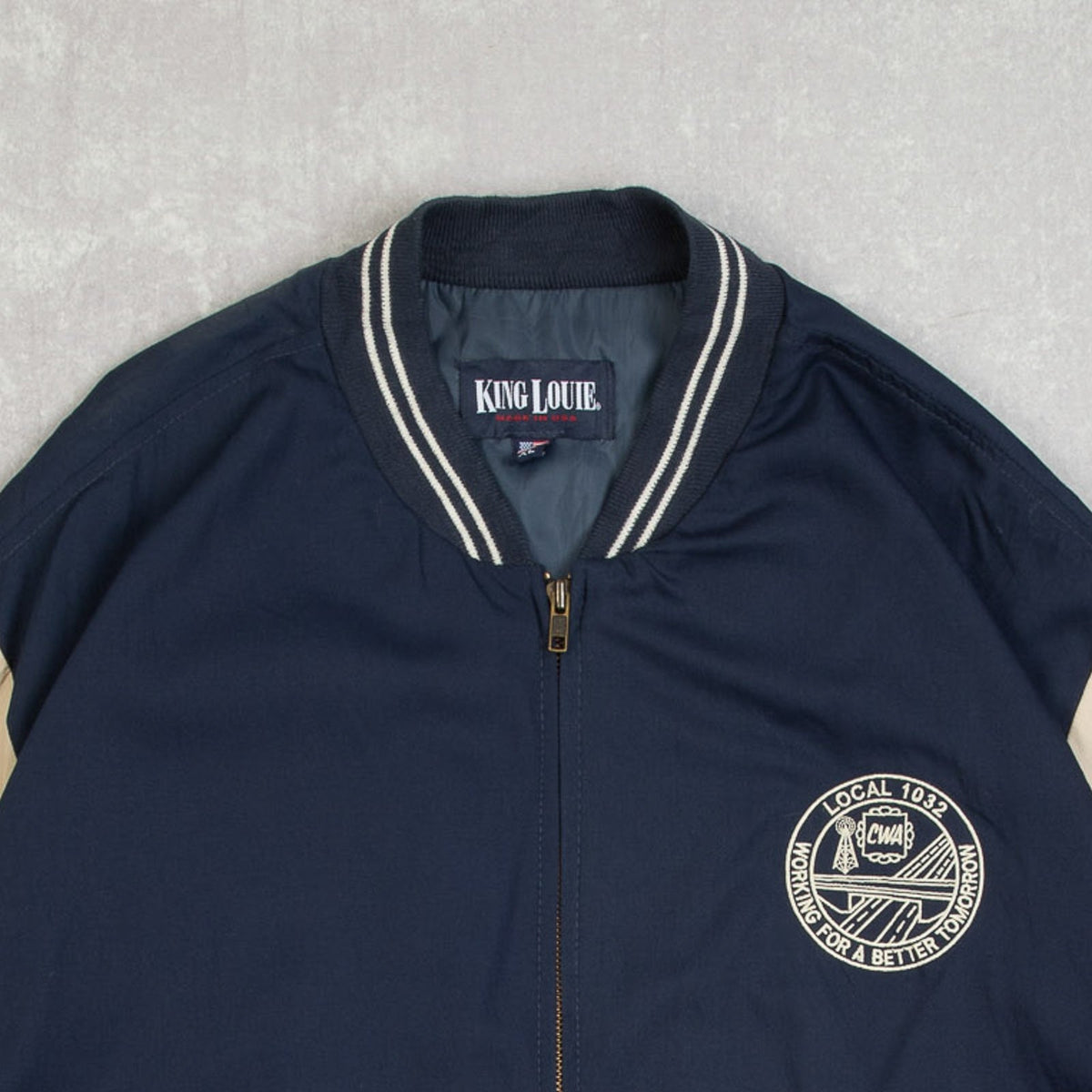 MEN'S VINTAGE 1990S CWA VARSITY BOMBER JACKET - X-LARGE