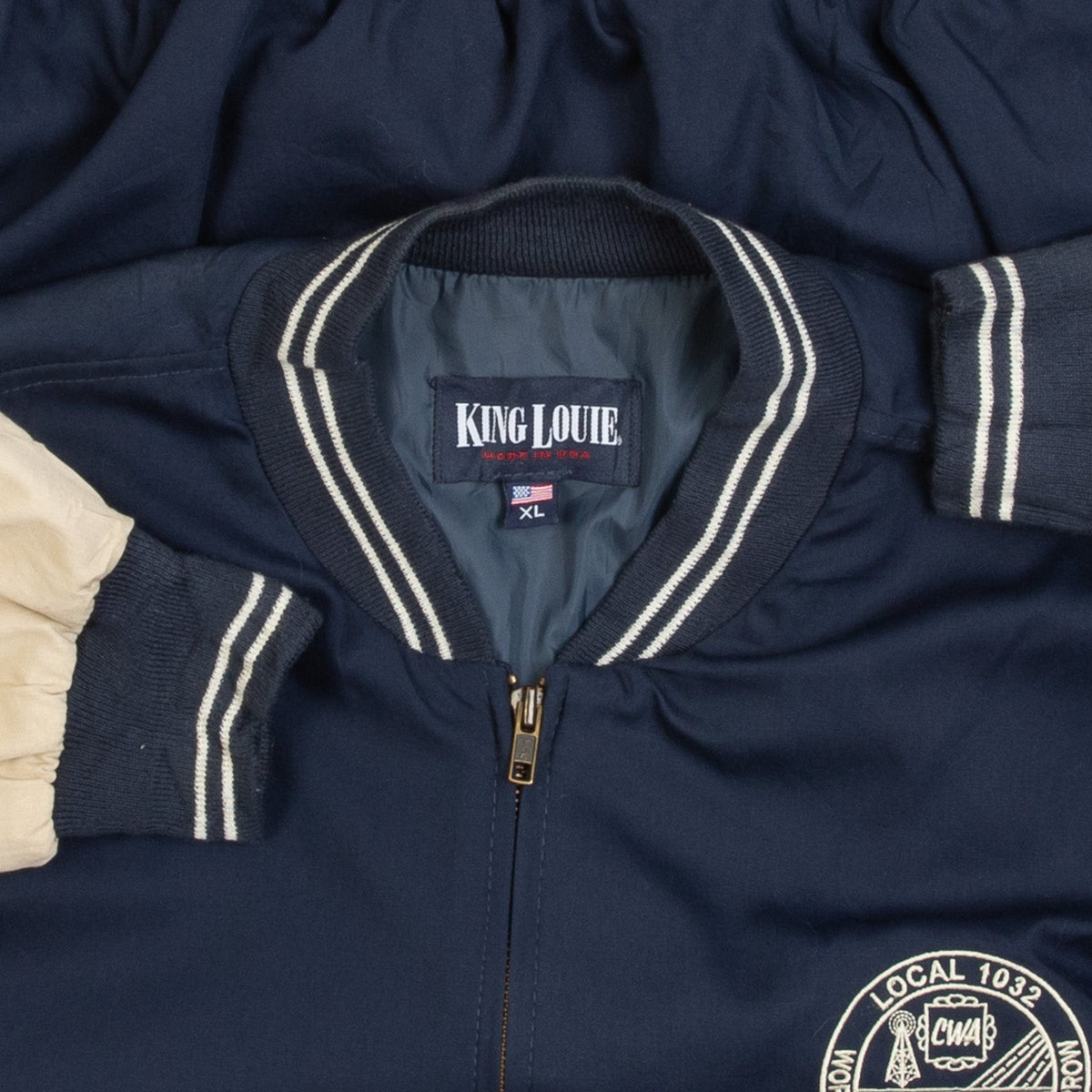 MEN'S VINTAGE 1990S CWA VARSITY BOMBER JACKET - X-LARGE