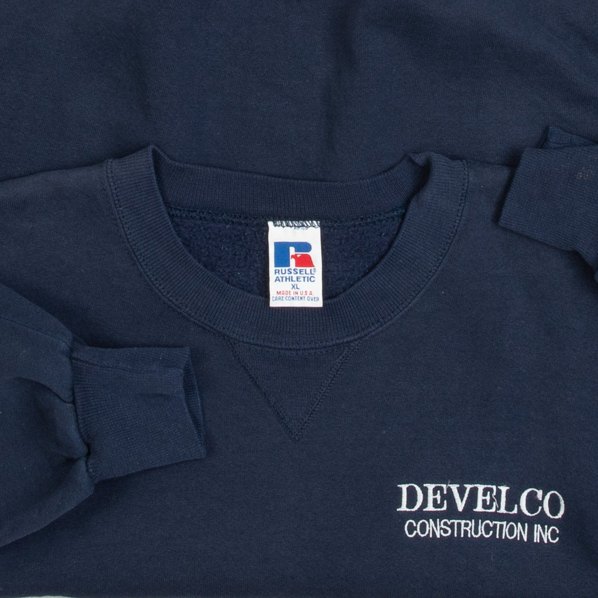 MEN'S VINTAGE 1990S RUSSELL ATHLETIC DEVELCO CONSTRUCTION SWEATSHIRT - X-LARGE