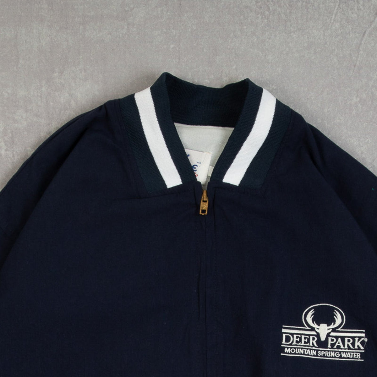 MEN'S VINTAGE 1980S DEER PARK VARSITY BOMBER JACKET - X-LARGE