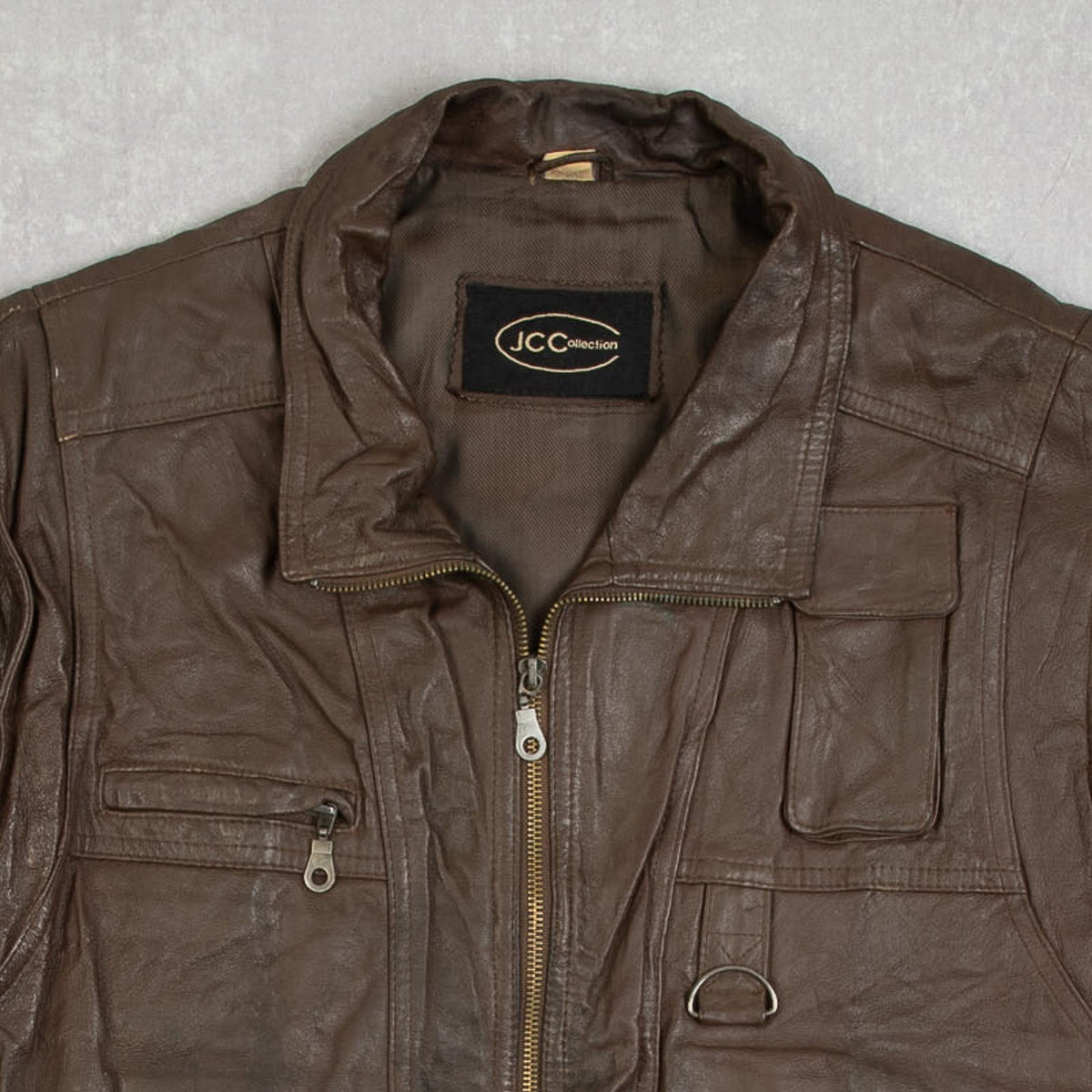 MEN'S VINTAGE 1980S LEATHER UTILITY VEST JACKET - LARGE