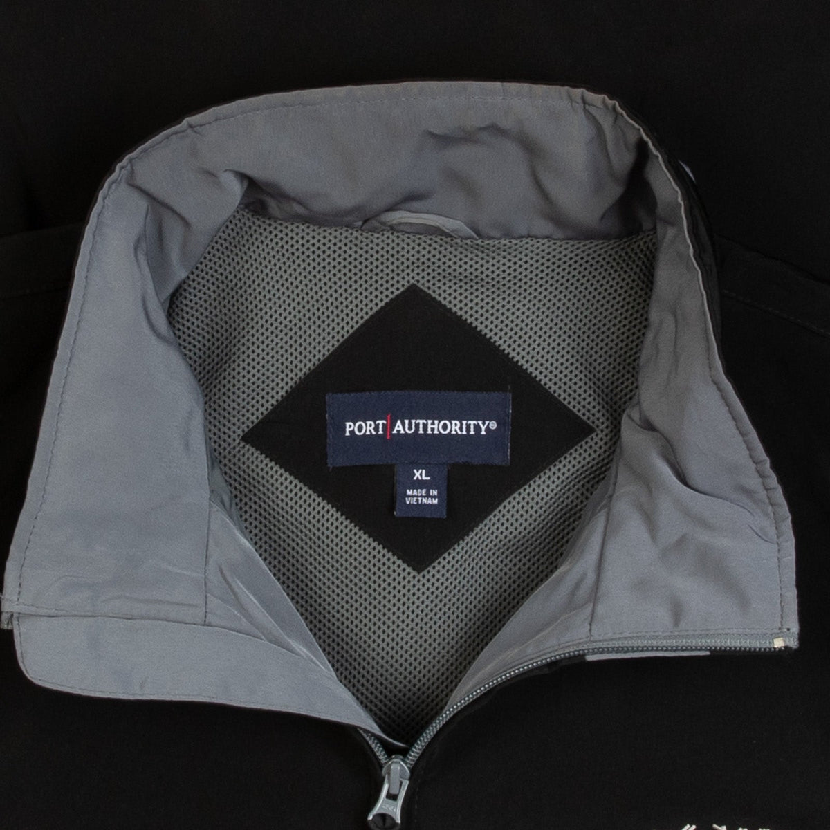 MEN'S VINTAGE 1990S TITAN WINDBREAKER JACKET - X-LARGE