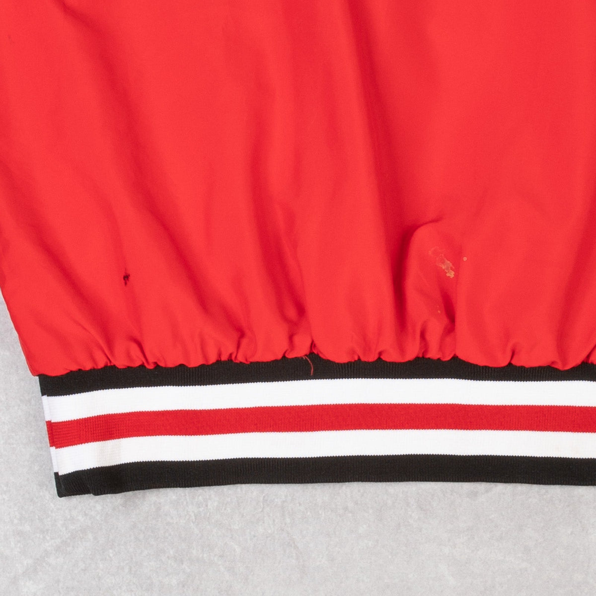 MEN'S VINTAGE 1990S REBELS HALF ZIP HOODED BOMBER JACKET - SMALL
